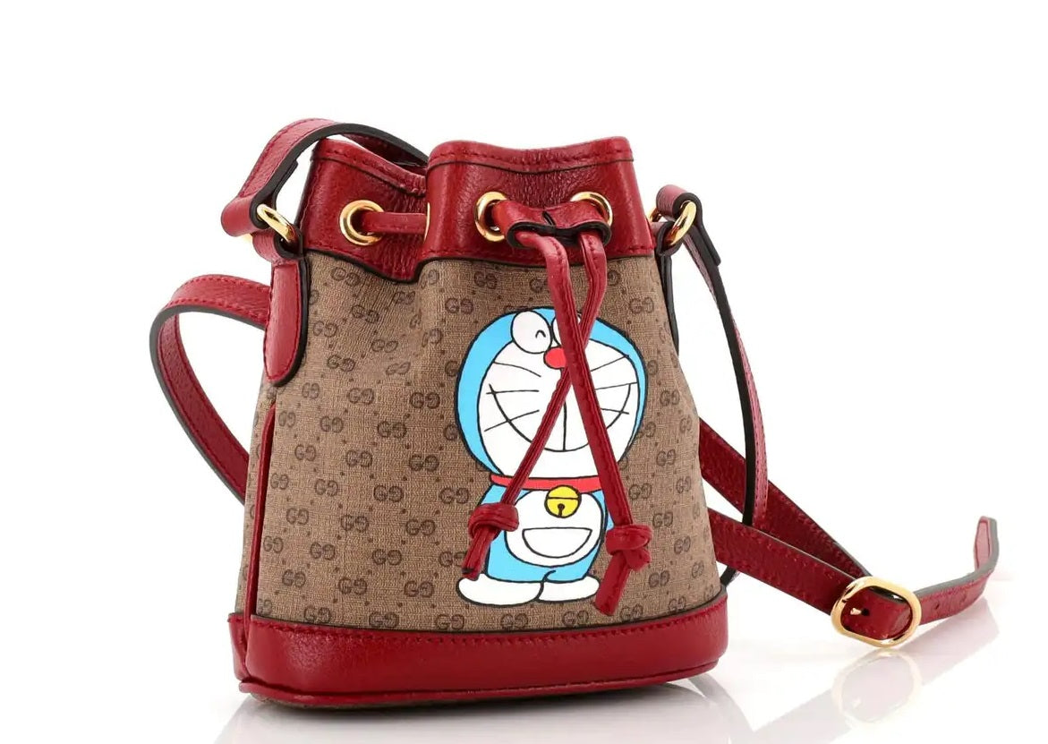 Gucci - Doraemon Bucket Bag Bedruckte Mini GG Mini aus beschichtetem Segeltuch